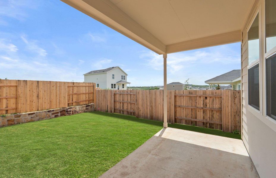 Exterior details and patio area of a home in Sunfield, Buda (Image 19).