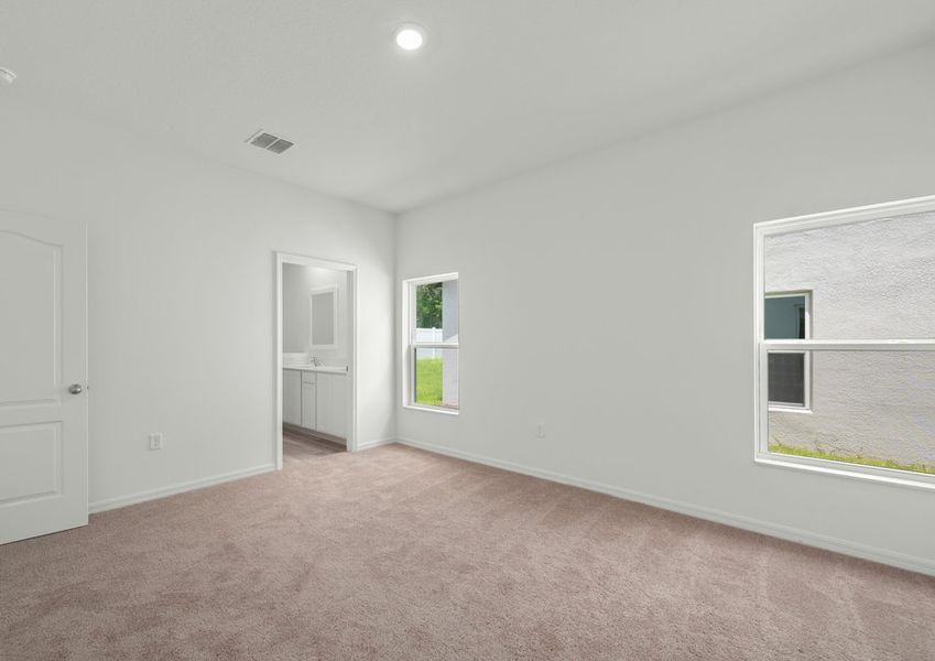 Master bedroom with two large windows Master bedroom with two large windows