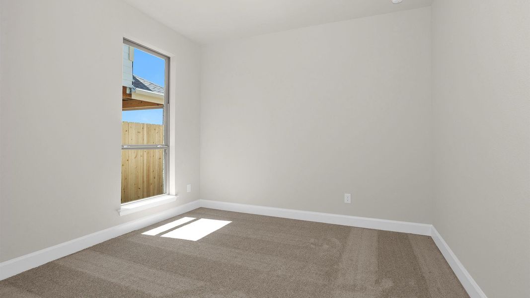 Spacious, unfurnished interior of a new home in Lakes of Cane Island, Katy (Image 4).