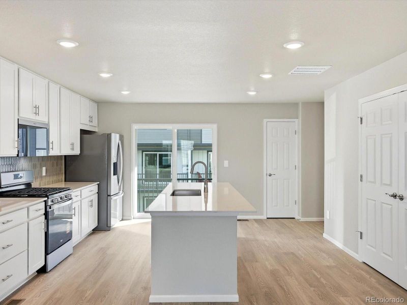 Furnished interior view inside a new home in Three Hills, Morrison (Image 12).
