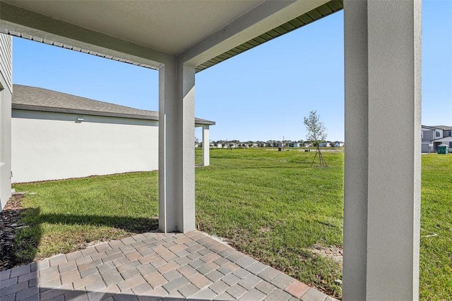 Exterior details and patio area of a home in The Reserve at Twin Lakes, St. Cloud (Image 24). Exterior details and patio area of a home in The Reserve at Twin Lakes, St. Cloud (Image 24).