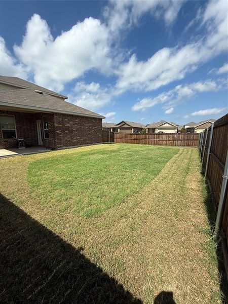 Exterior details and patio area of a home in Travis Ranch Marina, Forney (Image 25).