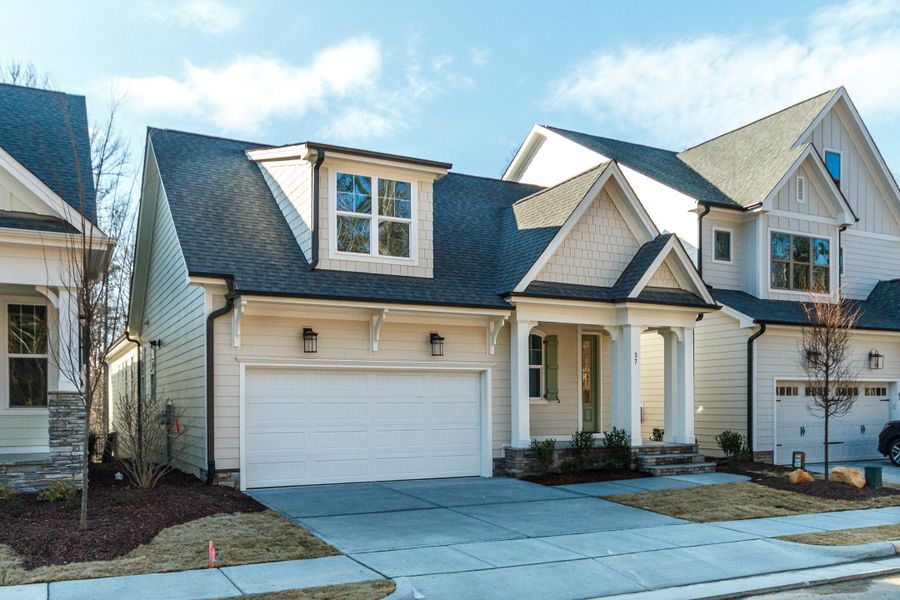 Representative exterior photo of a completed home built from the Cameron by Homes by Dickerson in Wendell Falls, Wendell, NC (Image 22). Representative exterior photo of a completed home built from the Cameron by Homes by Dickerson in Wendell Falls, Wendell, NC (Image 22).