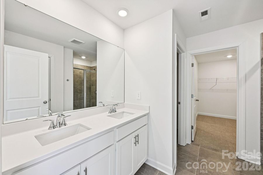 Photo is not of the actual home, but is an inspirational photo of builder’s model home and may depict options, furnishings, and/or decorator features that are not included