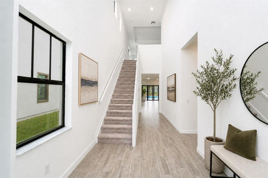 Furnished interior view inside a new home in Tesoro Club, Port St. Lucie (Image 10).