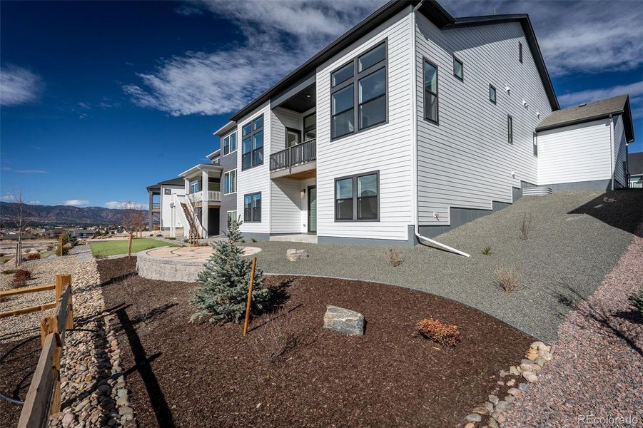 Exterior details and patio area of a home in Cloverleaf - Pinnacle Collection, Monument (Image 2).