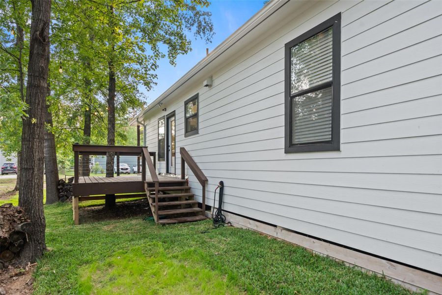 Secluded porch tucked away on the side of the house accessed directly from the kitchen area.