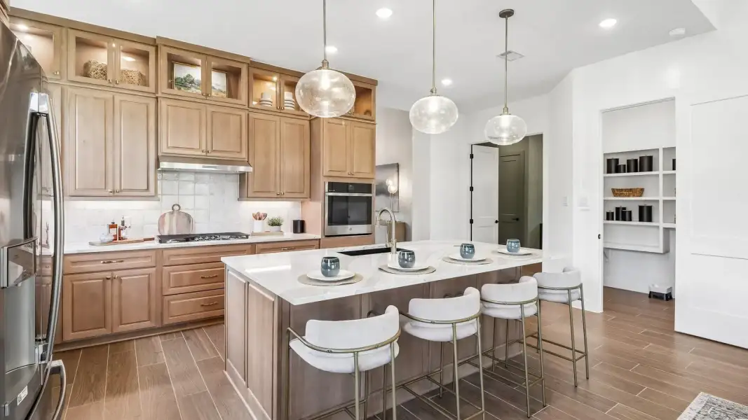 Representative furnished interior of a home built from the Lauren by Chesmar Homes in Audubon, Magnolia (Image 16).