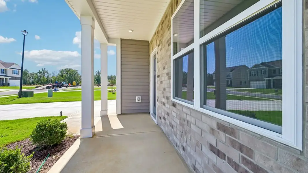 Exterior details and patio area of a home in Shahbain Reserve, Raeford (Image 3). Exterior details and patio area of a home in Shahbain Reserve, Raeford (Image 3).
