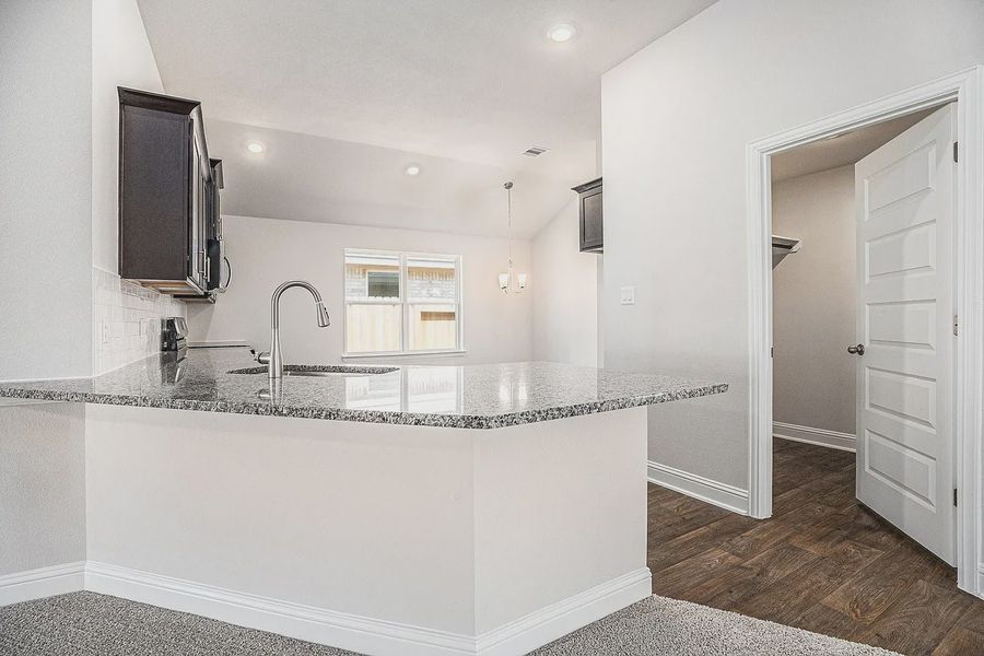 Furnished interior view inside a new home in Kiber Reserve, Angleton (Image 4).
