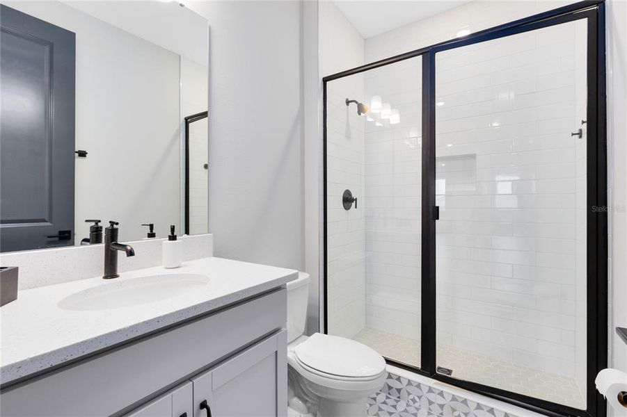 Furnished interior view inside a new home in Laureate Park, Orlando (Image 30).