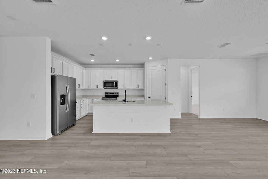 Furnished interior view inside a new home in Hyland Trail, Green Cove Springs (Image 7).