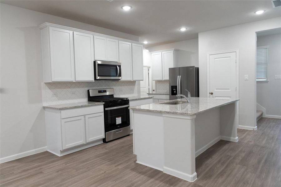 Furnished interior view inside a new home in Lakes at Black Oak, Magnolia (Image 4).