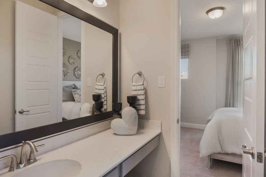 Representative furnished interior of a home built from the Hampton by Chesmar Homes in Esperanza 50's, Boerne (Image 11).