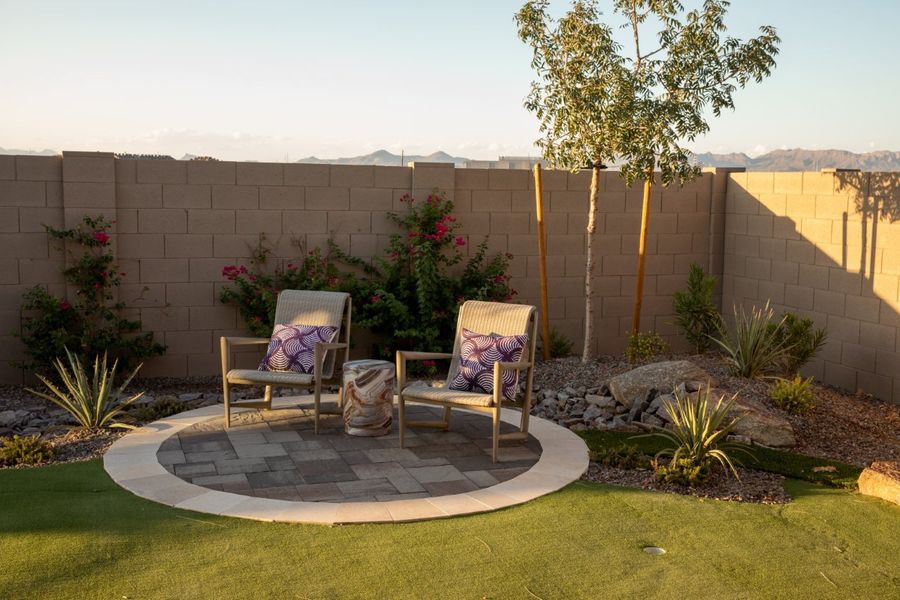 Exterior details and patio area of a home in Elegance at Eastmark, Mesa (Image 8).