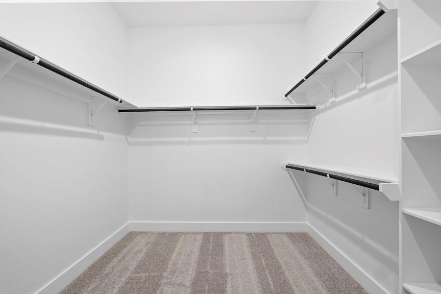 This closet is a perfect blank canvas to design a custom closet with ample hanging space, perfectly organized drawers, and chic shoe racks come together seamlessly, ensuring that everything has its place. This closet is a perfect blank canvas to design a custom closet with ample hanging space, perfectly organized drawers, and chic shoe racks come together seamlessly, ensuring that everything has its place.