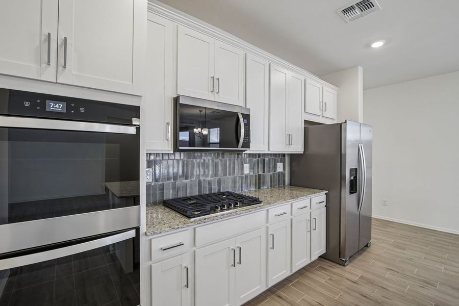 Furnished interior view inside a new home in Mandarina Reserve, Marana (Image 11).