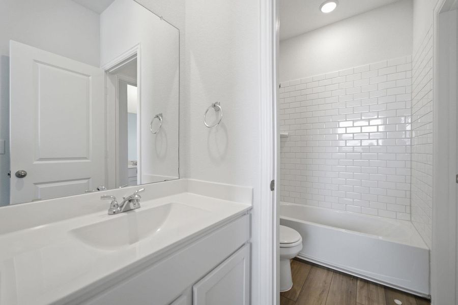 Furnished interior view inside a new home in Municipal Drive Townhomes, Leander (Image 4). Furnished interior view inside a new home in Municipal Drive Townhomes, Leander (Image 4).