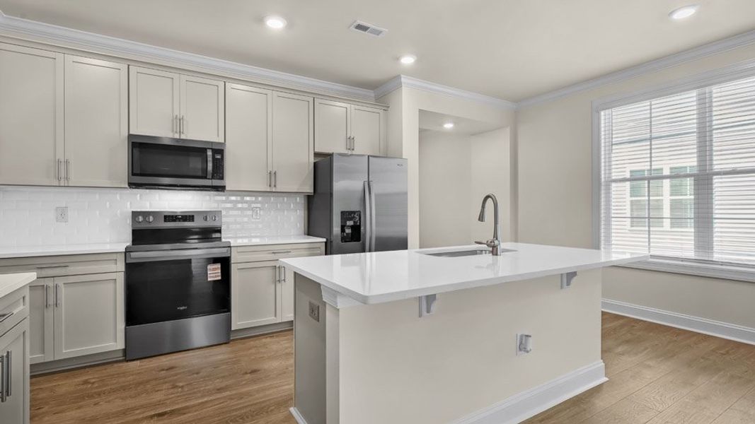 Furnished interior view inside a new home in Lybrook Village, Advance (Image 6).