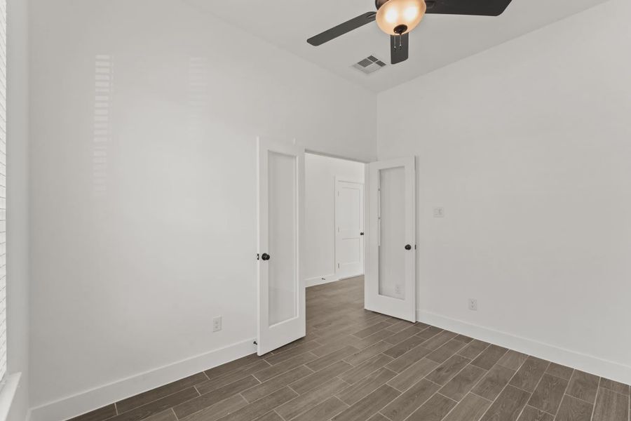 Representative unfurnished interior of a home built from the Rowen by Chesmar Homes in Brookewater 45's, Rosenberg (Image 30).