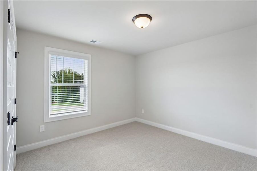Spacious, unfurnished interior of a new home in Vines at Mill Creek - Estate Series, Braselton (Image 32). Spacious, unfurnished interior of a new home in Vines at Mill Creek - Estate Series, Braselton (Image 32).