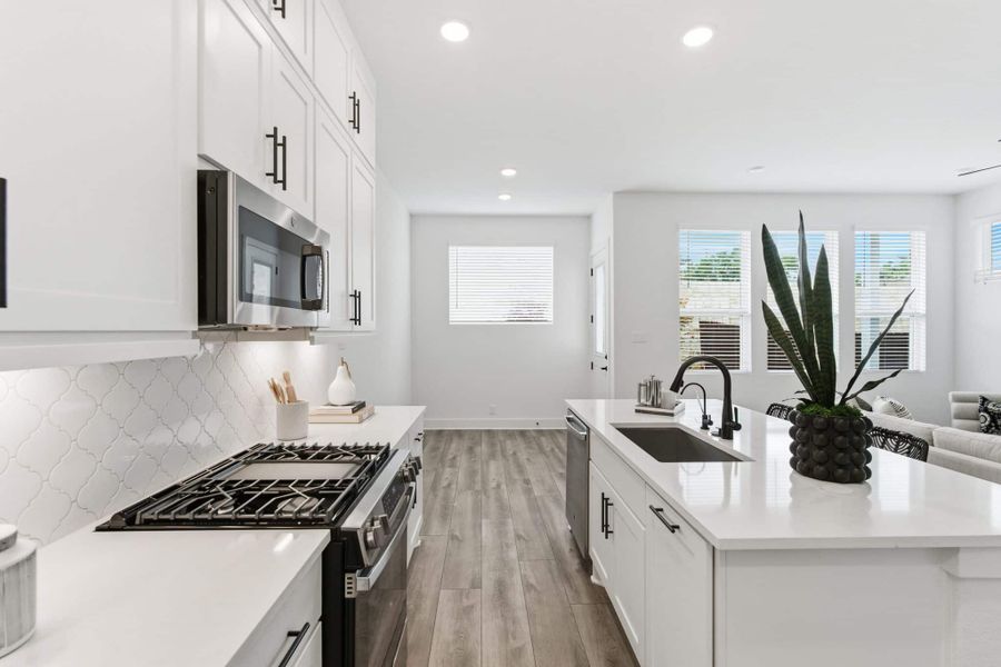 Representative furnished interior of a home built from the Balder by Chesmar Homes in Centero at Stone Oak, San Antonio (Image 7).