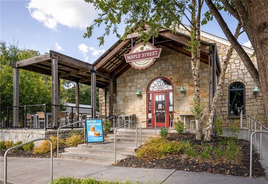 Front exterior of a new home in Evanshire Single Family, Duluth, GA, highlighting curb appeal (Image 24). Front exterior of a new home in Evanshire Single Family, Duluth, GA, highlighting curb appeal (Image 24).