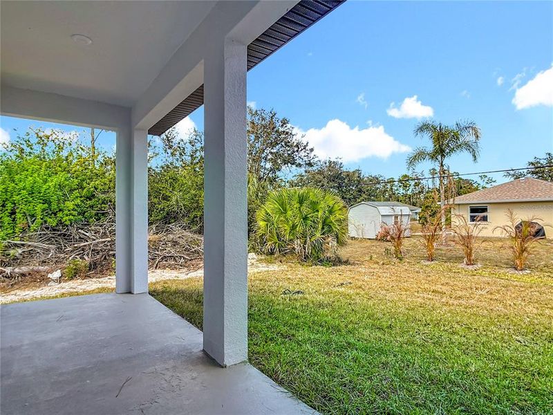 Exterior details and patio area of a home in , Port Charlotte (Image 23).