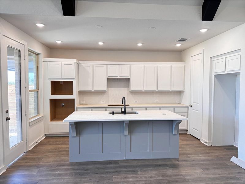 Sophisticated and functional—classic two-tone cabinets in a chef-worthy kitchen. Sophisticated and functional—classic two-tone cabinets in a chef-worthy kitchen.