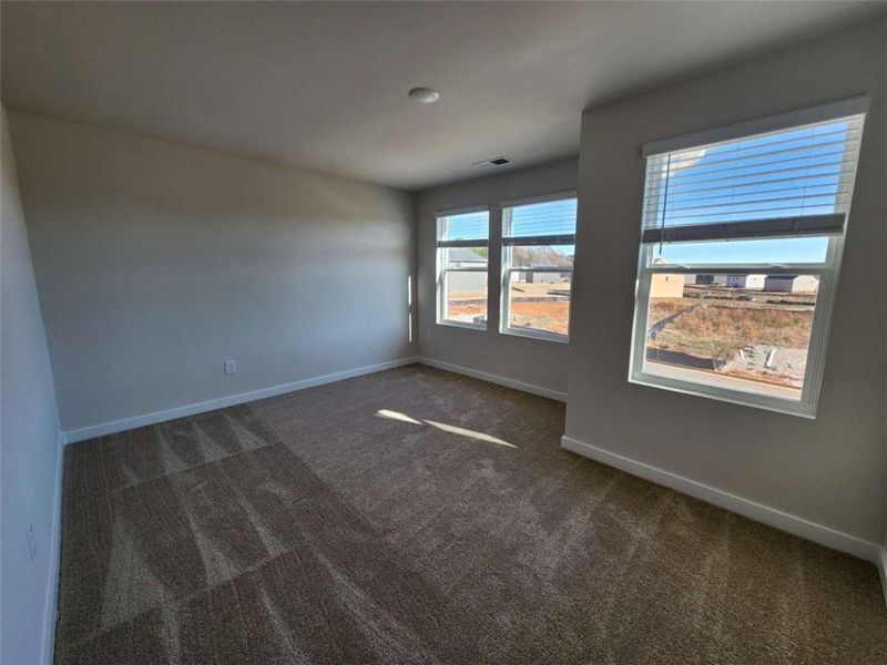 Spacious, unfurnished interior of a new home in Southern Hills, McDonough (Image 40).