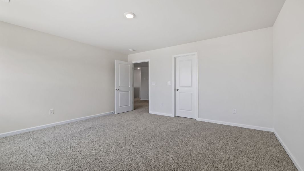 Spacious, unfurnished interior of a new home in Durbin Meadows Traditions, Fountain Inn (Image 29).