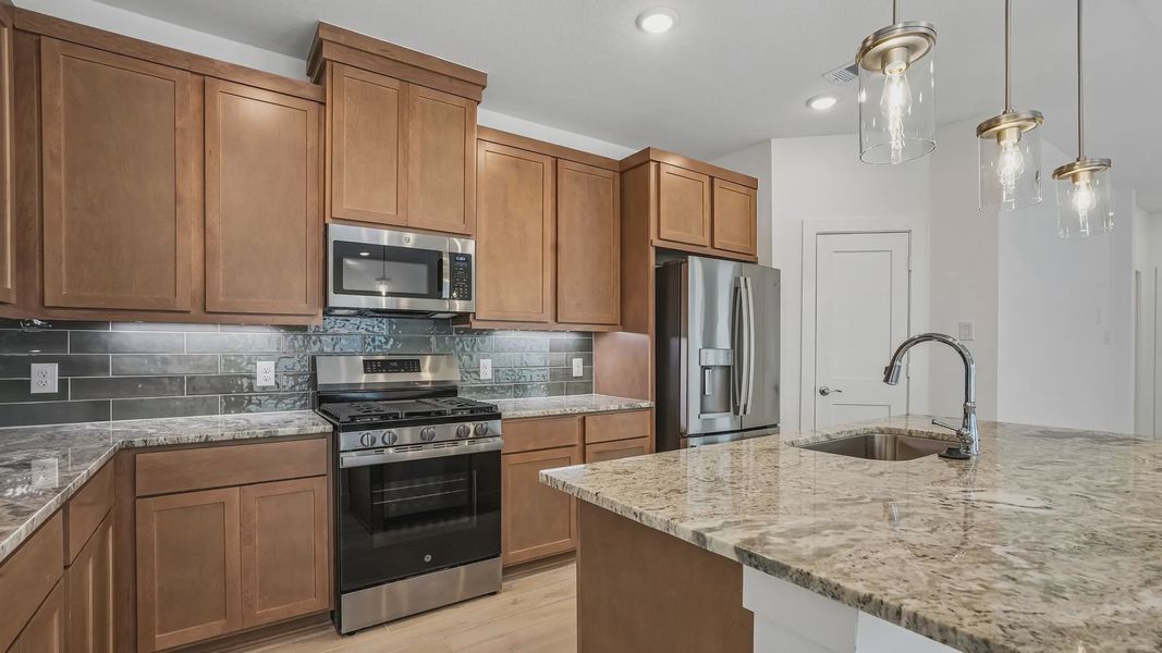 Furnished interior view inside a new home in Meridiana Townhomes, Iowa Colony (Image 6).