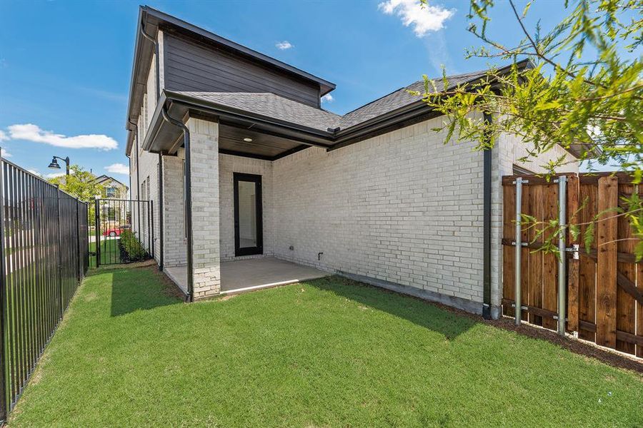 Exterior details and patio area of a home in Cottages of Celina, Celina (Image 4).