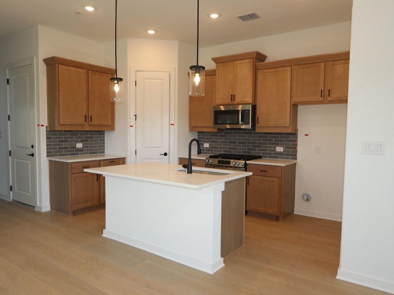 Furnished interior view inside a new home in Estancia West, Manchaca (Image 10). Furnished interior view inside a new home in Estancia West, Manchaca (Image 10).