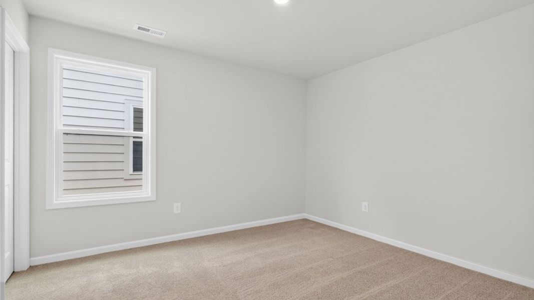 Spacious, unfurnished interior of a new home in Madden West, Fuquay Varina (Image 25).