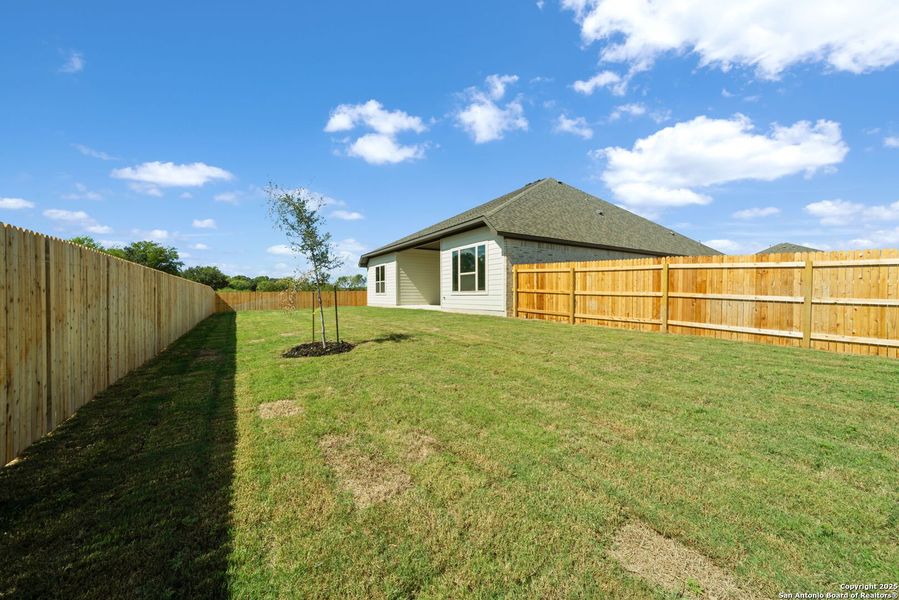 Exterior details and patio area of a home in , Castroville (Image 4).