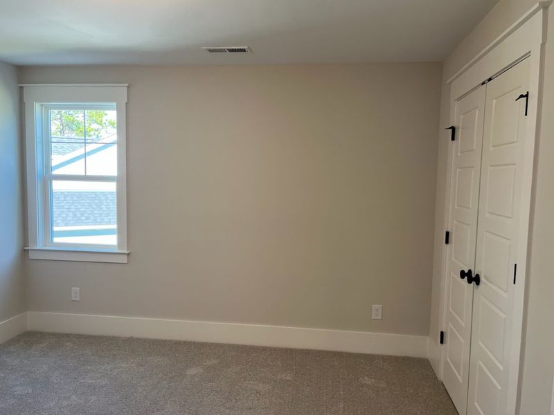 Spacious, unfurnished interior of a new home in Osprey Landing, Southport (Image 23).