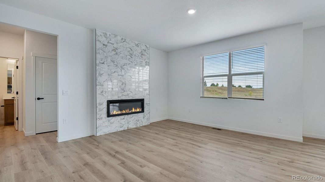 Spacious, unfurnished interior of a new home in Trails at Crowfoot, Parker (Image 24).