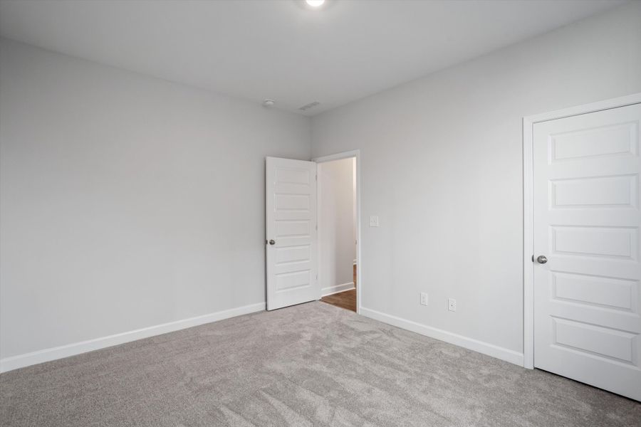 Spacious, unfurnished interior of a new home in Ovation at Sweetbrier, Durham (Image 31).