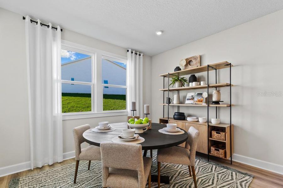 Furnished interior view inside a new home in The Cypress Series at Reserve East, Flagler Beach (Image 16).