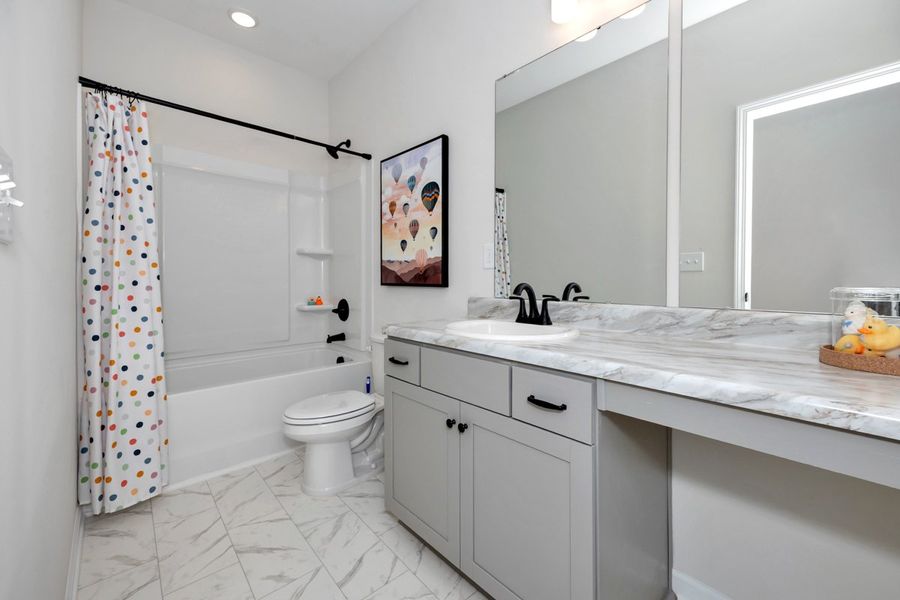 Representative furnished interior of a home built from the The Hampton by Smith Douglas Homes in La Segarra, Brookshire (Image 19).