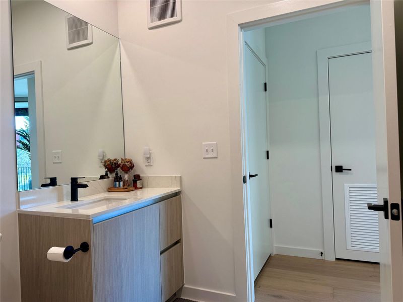 A well-appointed bathroom vanity with a spacious counter and modern fixtures.