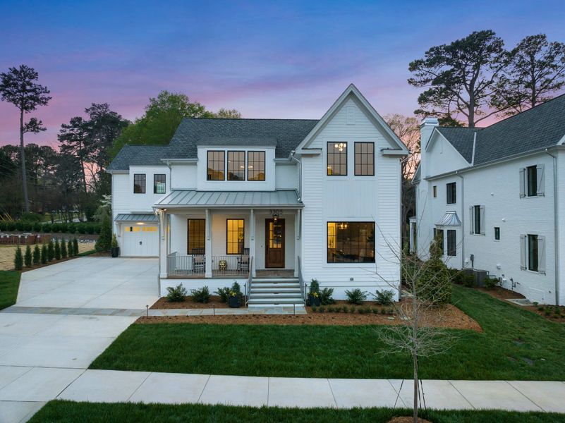 Representative exterior photo of a completed home built from the Grace by Homes by Dickerson in The Founding at Blue Ridge, Raleigh, NC (Image 1). Representative exterior photo of a completed home built from the Grace by Homes by Dickerson in The Founding at Blue Ridge, Raleigh, NC (Image 1).