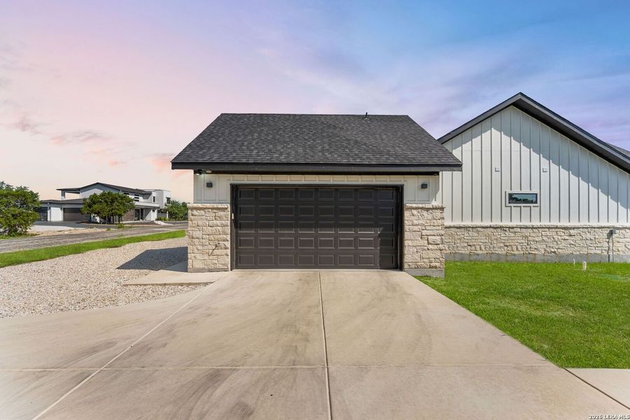 Front exterior of a new home in , Mico, TX, highlighting curb appeal (Image 2). Front exterior of a new home in , Mico, TX, highlighting curb appeal (Image 2).