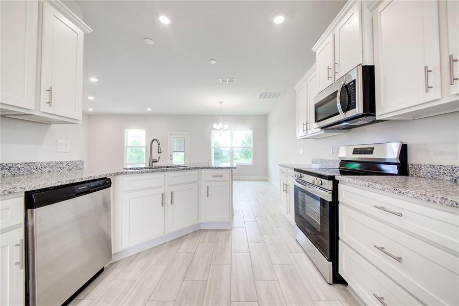 Furnished interior view inside a new home in Aviary at Rutland Ranch, Parrish (Image 6).