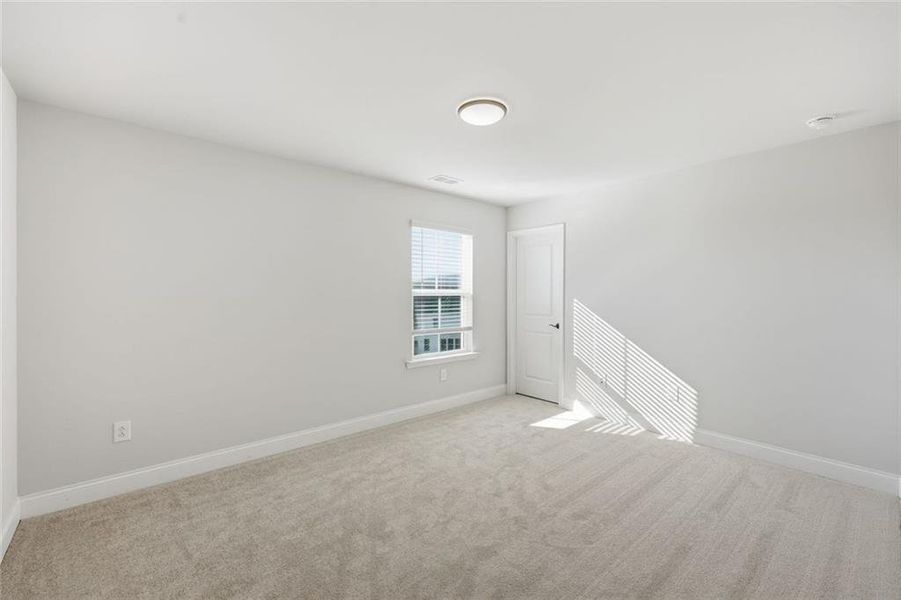 Spacious, unfurnished interior of a new home in Berkeley Mill, Cumming (Image 42).
