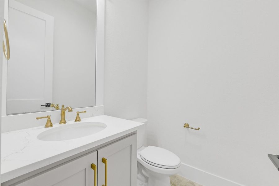 Half Bathroom which is located down the hall by the Home Office/Study