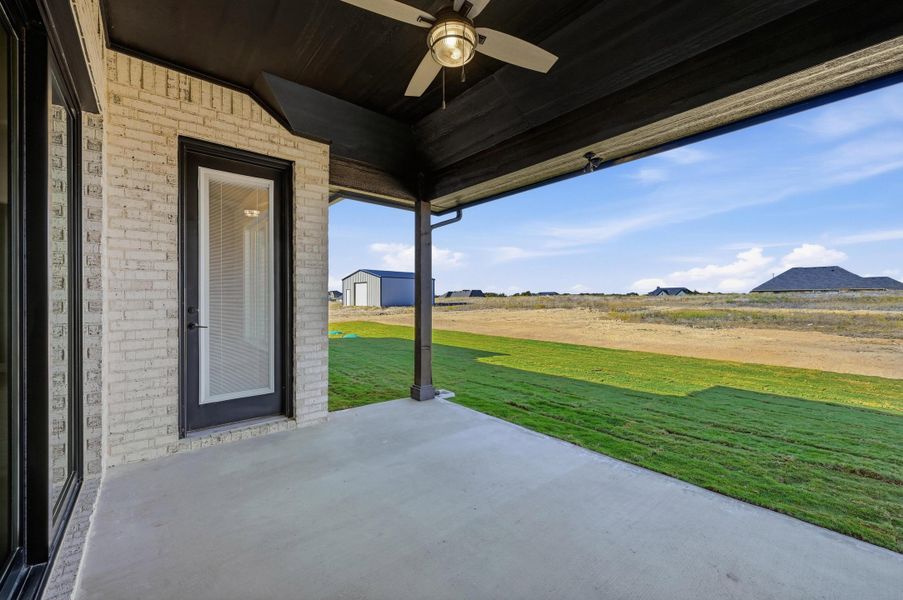 Front exterior of a new home in Rocky Top Ranch, Azle, TX, highlighting curb appeal (Image 25). Front exterior of a new home in Rocky Top Ranch, Azle, TX, highlighting curb appeal (Image 25).