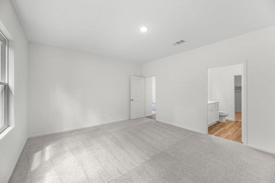 Representative unfurnished interior of a home built from the Prism by Starlight Homes in Brookshire at Legacy Hills, Celina (Image 18).