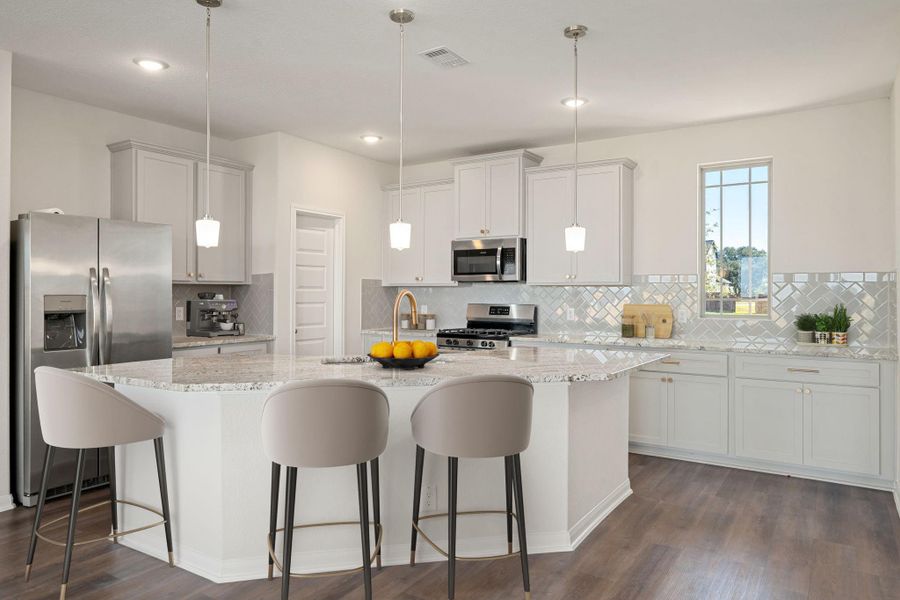 fThe bright and airy kitchen features clean lines, sleek finishes, and a functional layout centered around a spacious island. Crisp white cabinetry and modern lighting elevate the design, creating a polished, contemporary feel that perfectly complements the home’s open-concept layout. fThe bright and airy kitchen features clean lines, sleek finishes, and a functional layout centered around a spacious island. Crisp white cabinetry and modern lighting elevate the design, creating a polished, contemporary feel that perfectly complements the home’s open-concept layout.